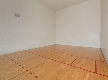 An empty room with a racquetball court